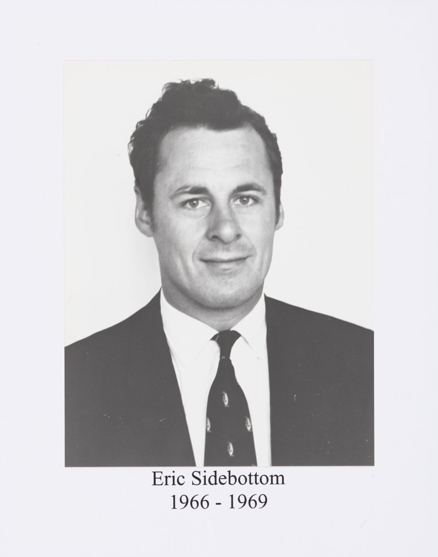 Black and white photo of Eric Sidebottom with the text 'Eric Sidebottom, 1966-1969