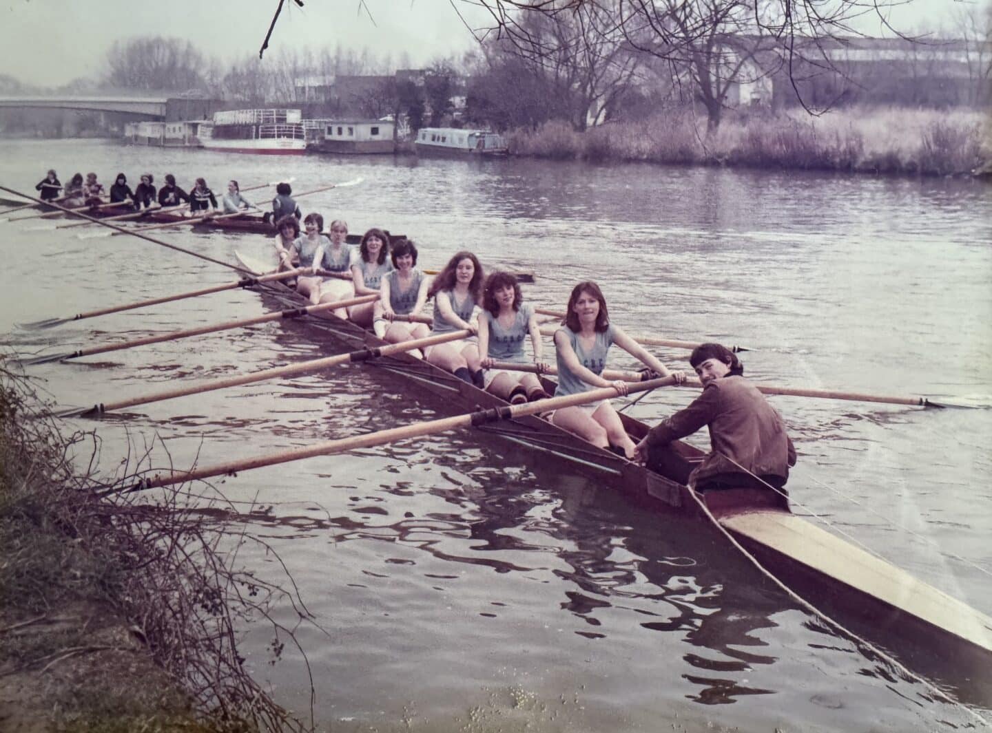 First Women’s VIII at Torpids, 1980: Lincoln College Women's First VIII crew in an eight on the river during Torpids 1980.
