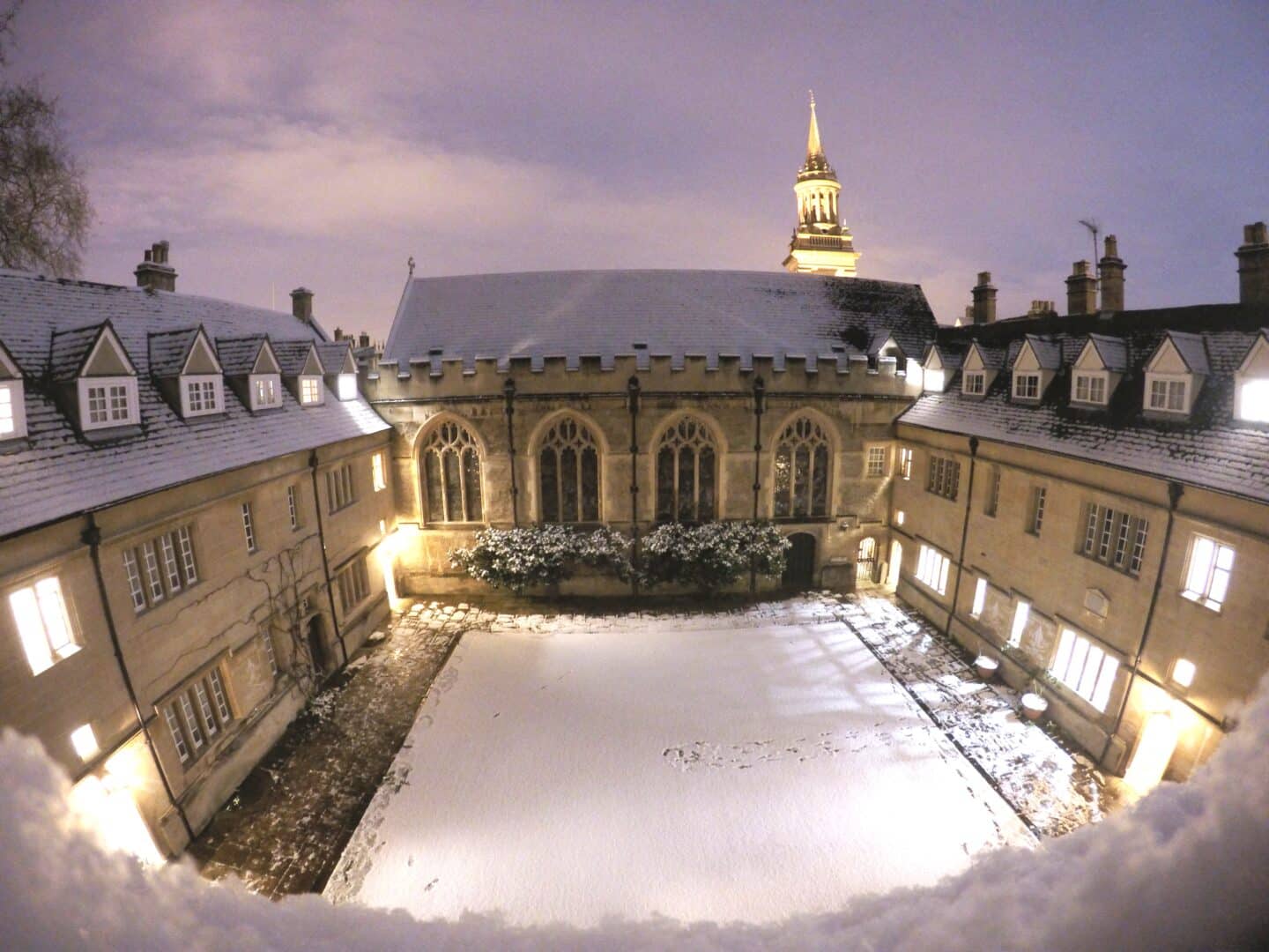 Photograph of Lincoln College's Chapel Quad from above, blanketed in snow