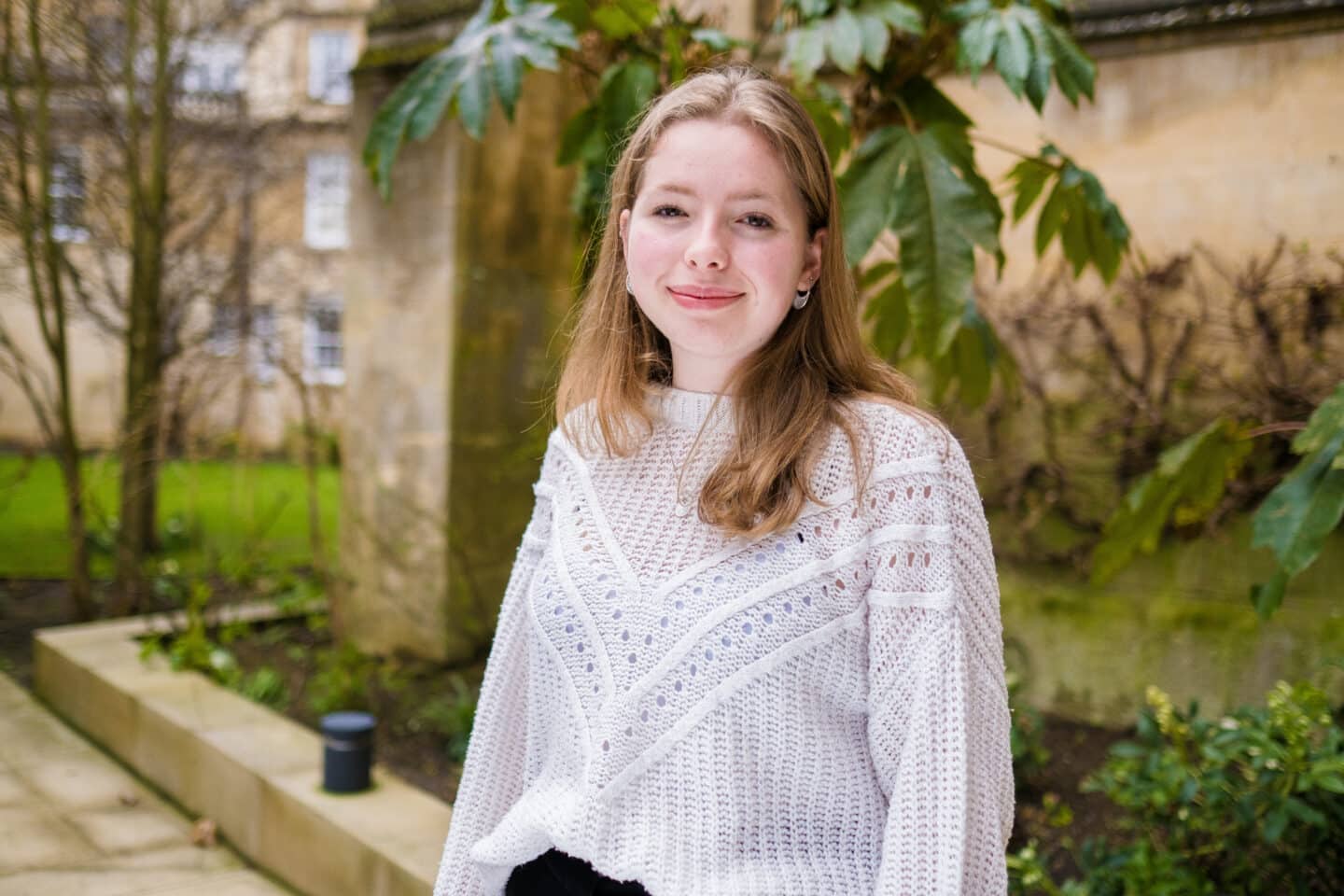 Photograph of Lizzie Smith, a student in a white top