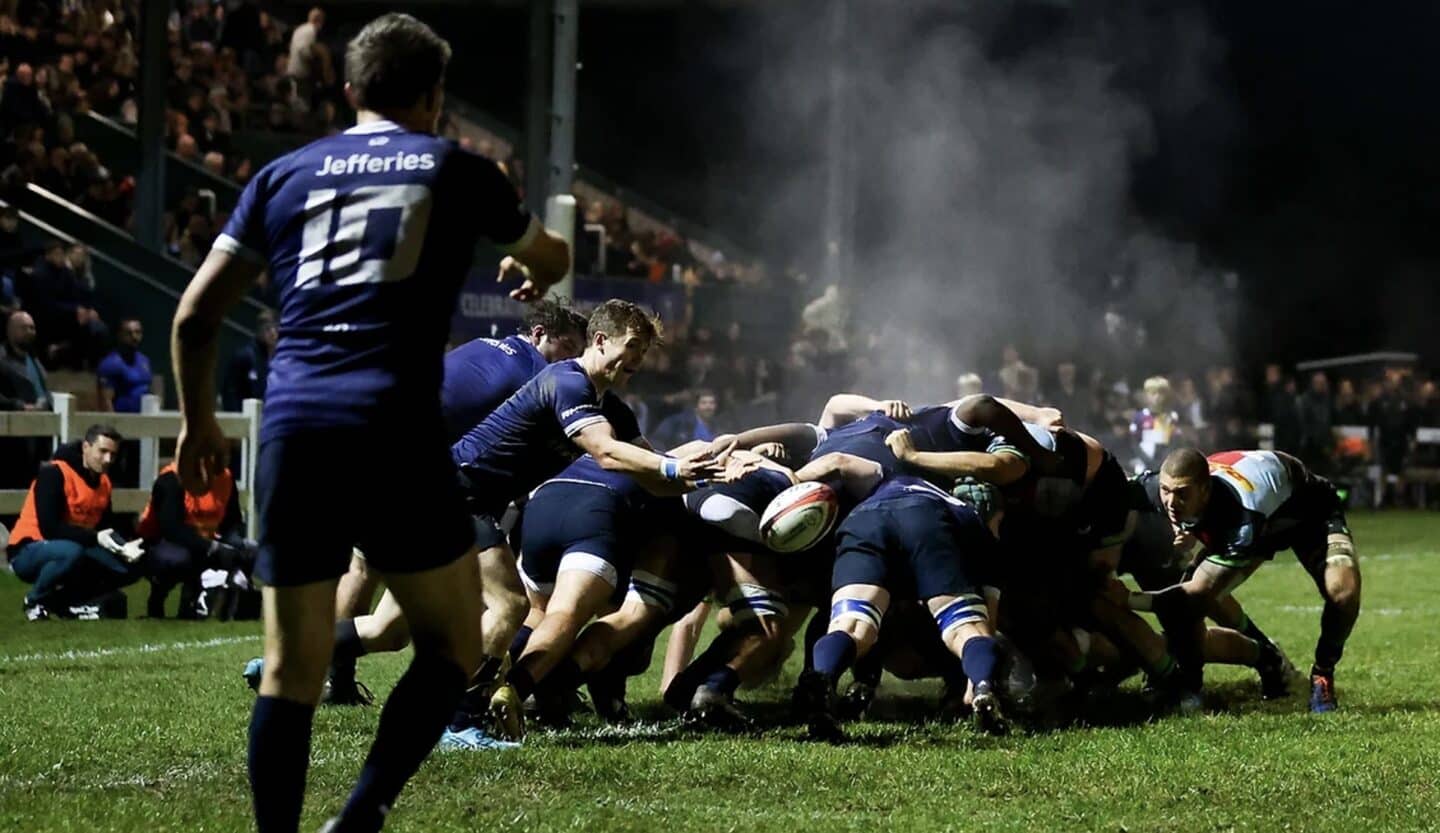 Action shot from a OURFC men's blues rugby match with the teams in a scrum