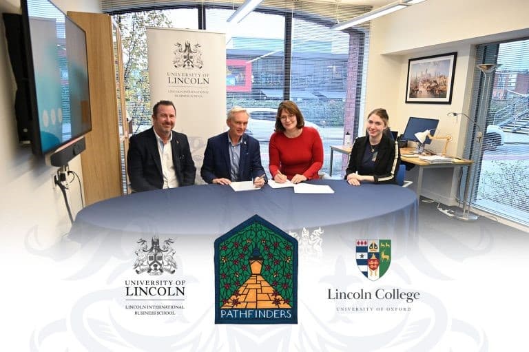 Four people sitting at a table with the University of Lincoln logo in the background. At the bottom of the image are the logos of the University of Lincoln, Pathfinders, and Lincoln College Oxford