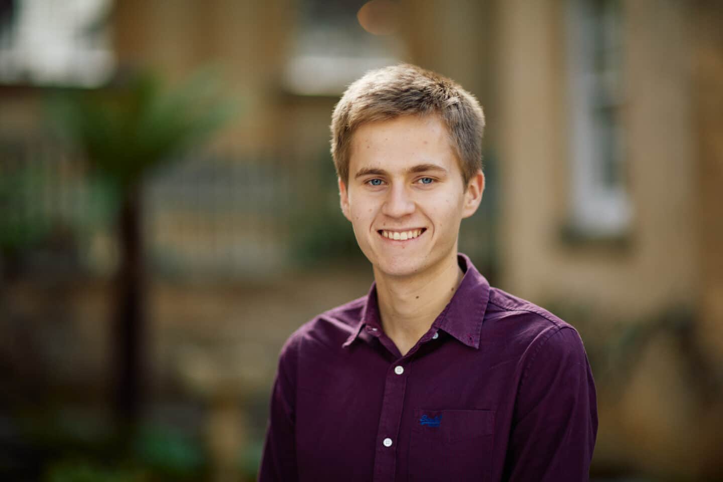 Image of Ben Wormald, a man in a purple shirt