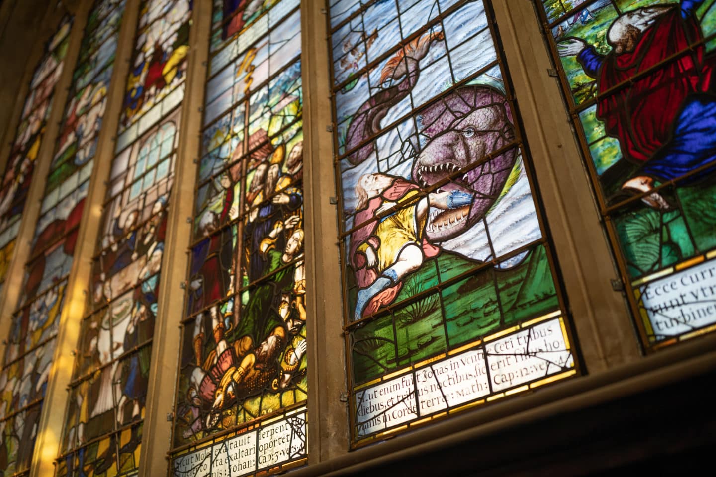 The East Window in Chapel, featuring six scenes from the Old Testament and six scenes from the New Testament