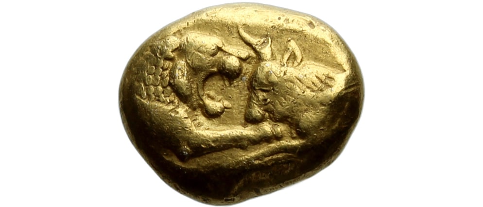 Gold Croeseid coin featuring a detailed design of a lion and a bull facing each other.