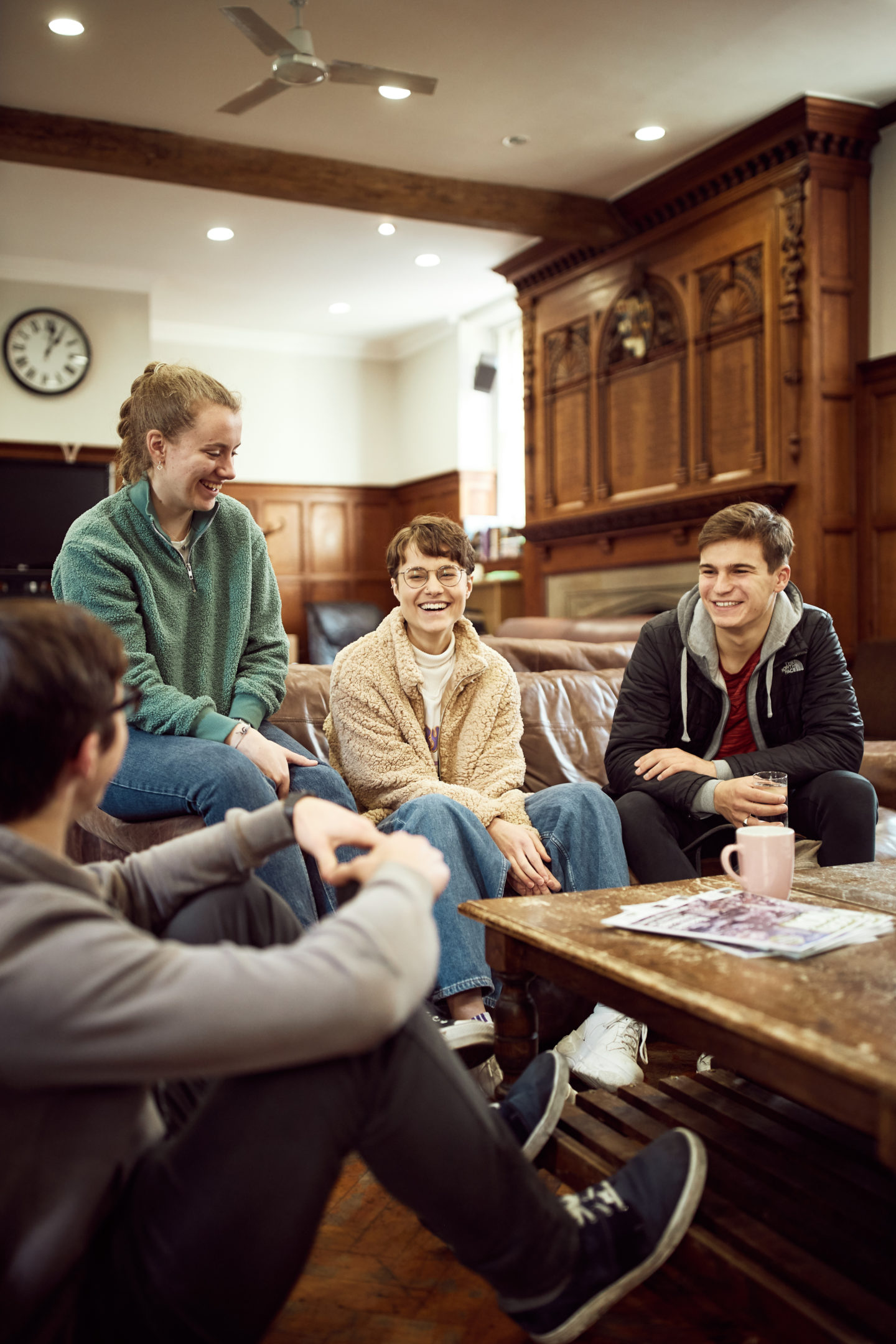 Students sitting around a table in the Lincoln College JCR