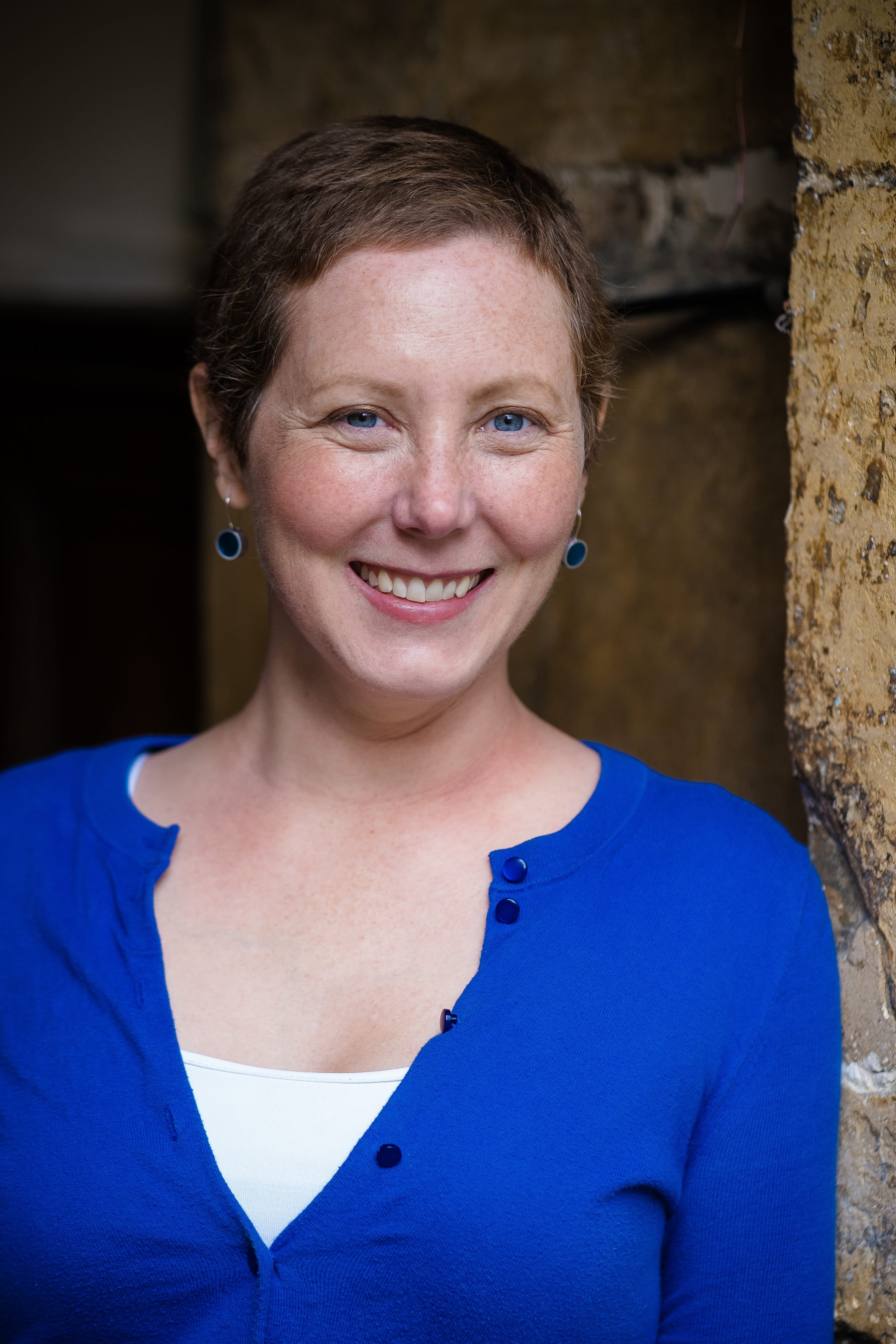head and shoulders photo of dr jody laporte smiling with cute freckles