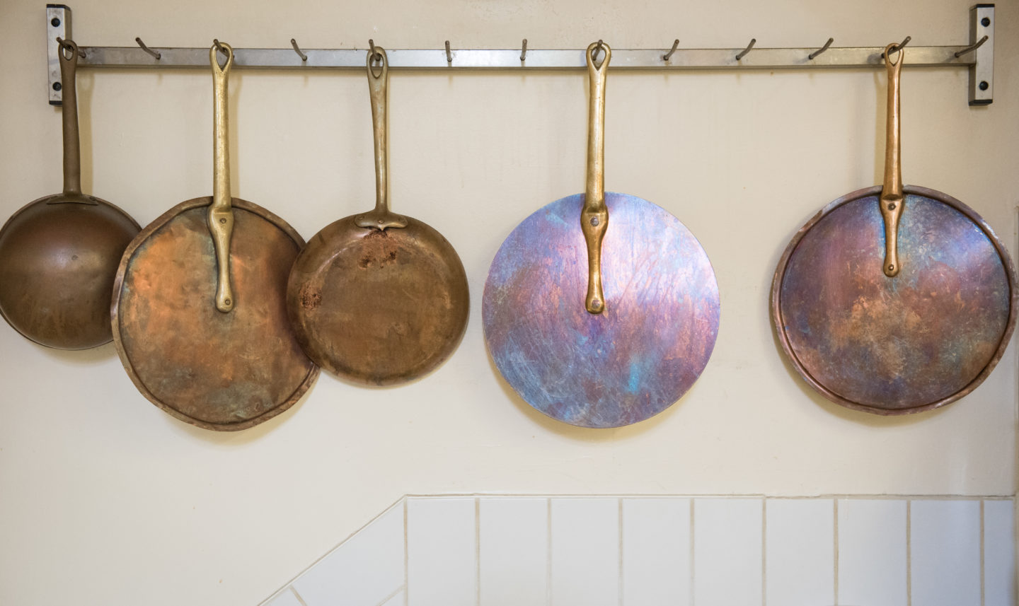 Pans hanging in the College Kitchen