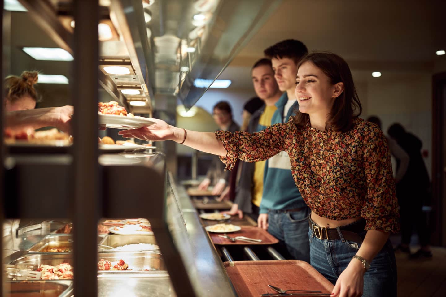 Lincoln students collect lunch in the Butter