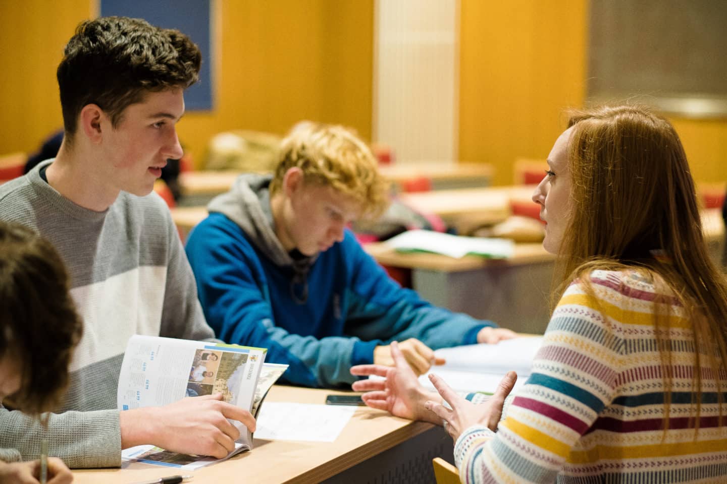 Schools Liaison Officer works with students at an access and outreach workshop