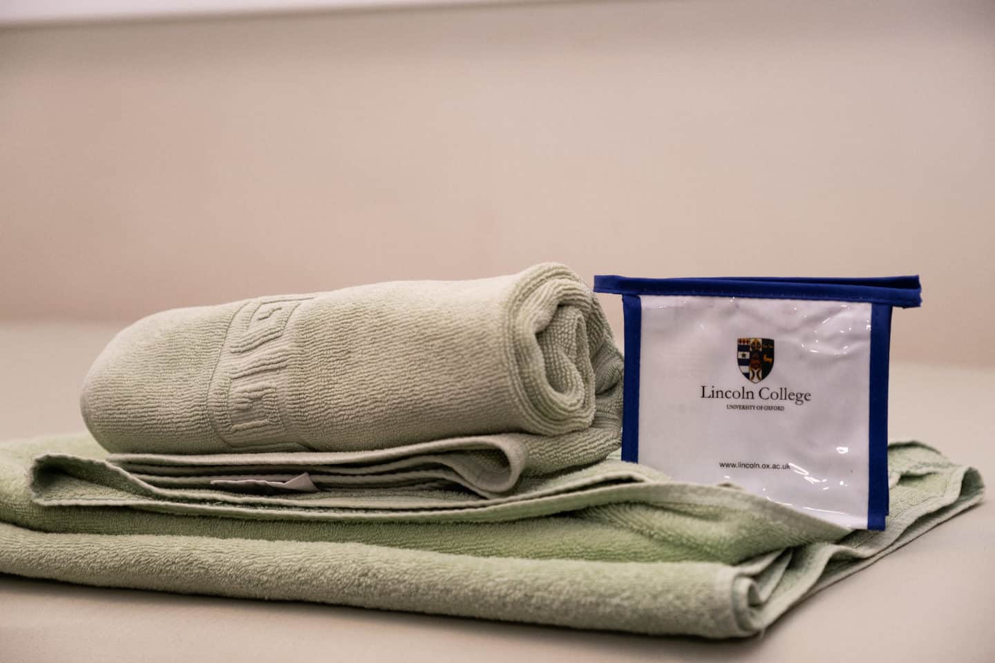 Towel and toiletries in a student guest room