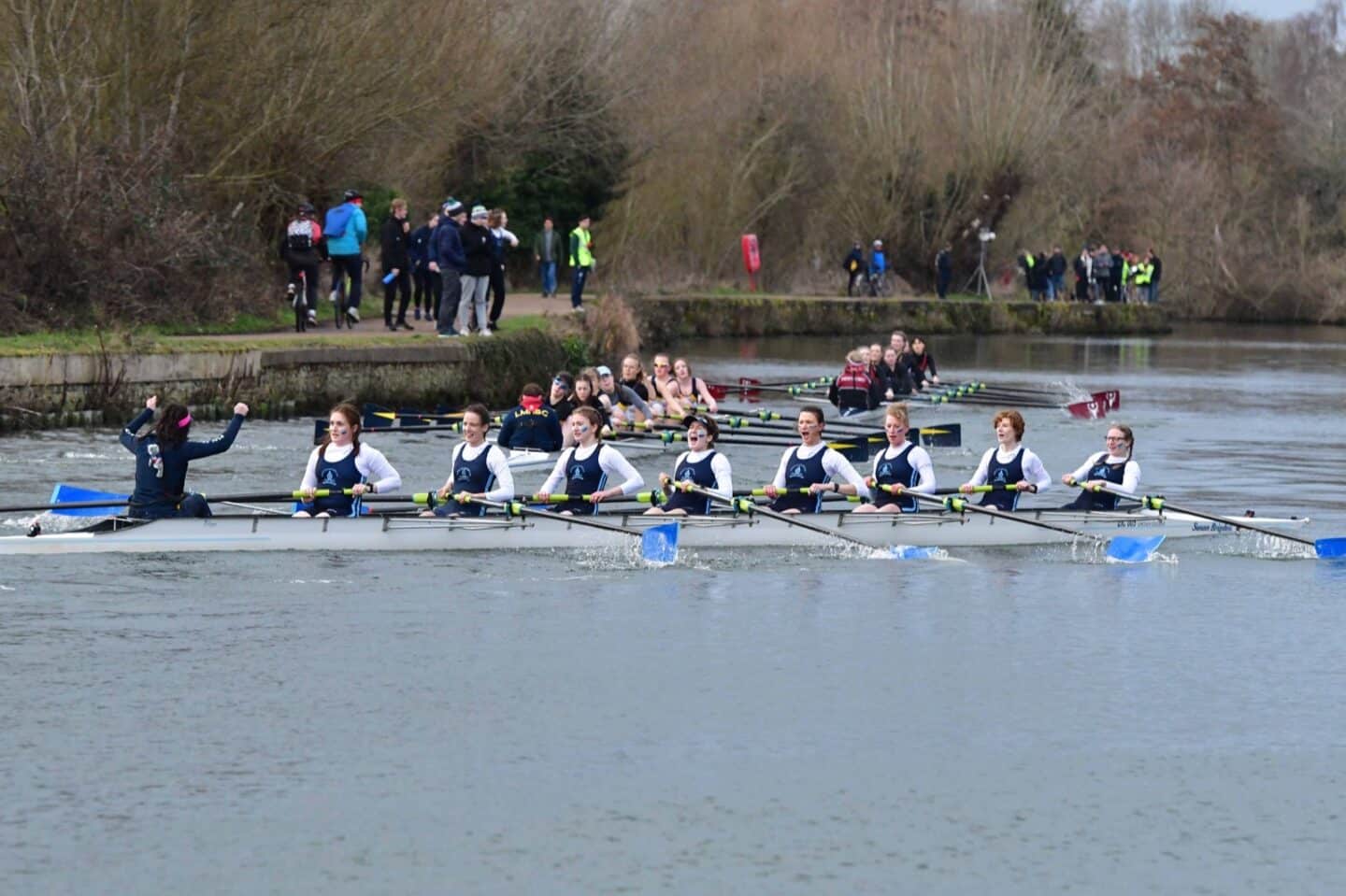 Women's crew rowing on the river